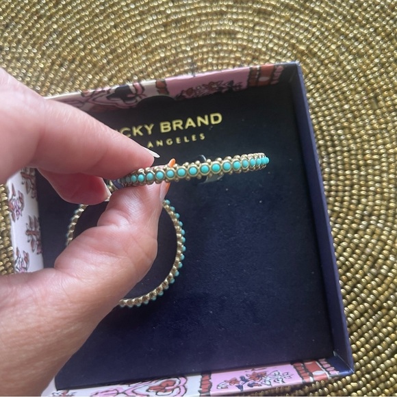 Lucky Brand Hoop Earrings golden color with embedded turquoise color stones. - Picture 3 of 5